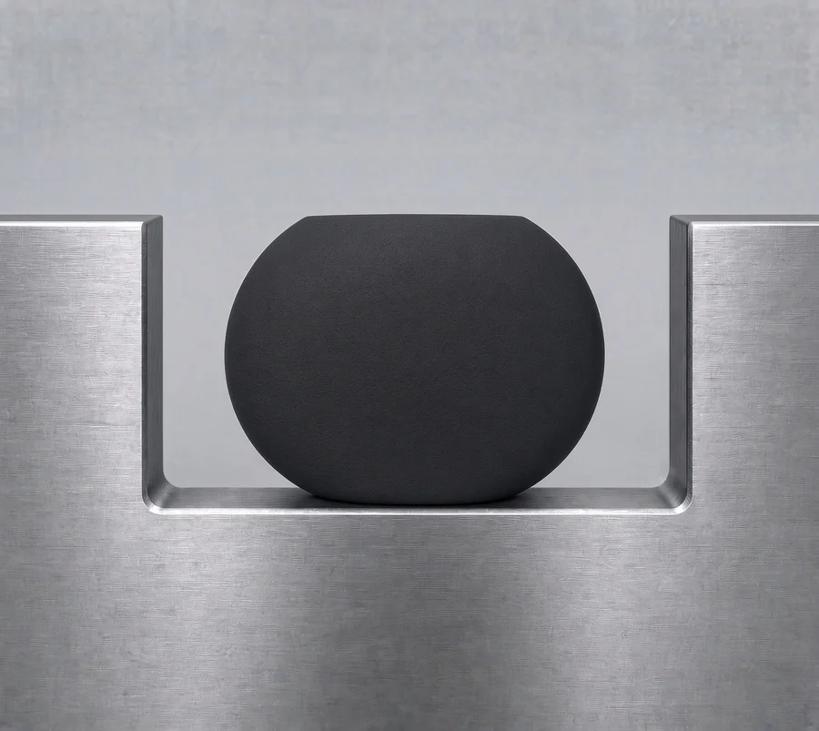 Cross-section of an O-ring flattened by compression set inside a metal gland groove