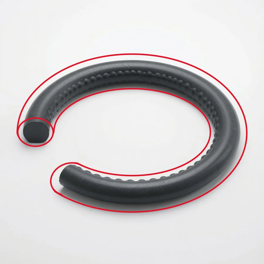 Cutaway O-ring with nibbled outer edge caused by high-pressure clearance extrusion